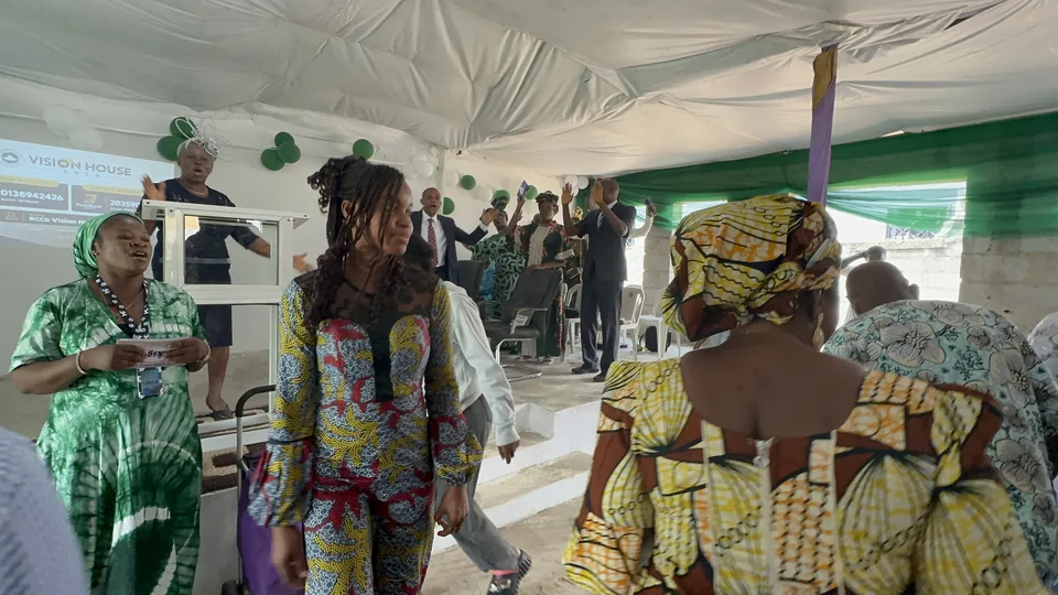 Women taking part in a worship service at Vision House